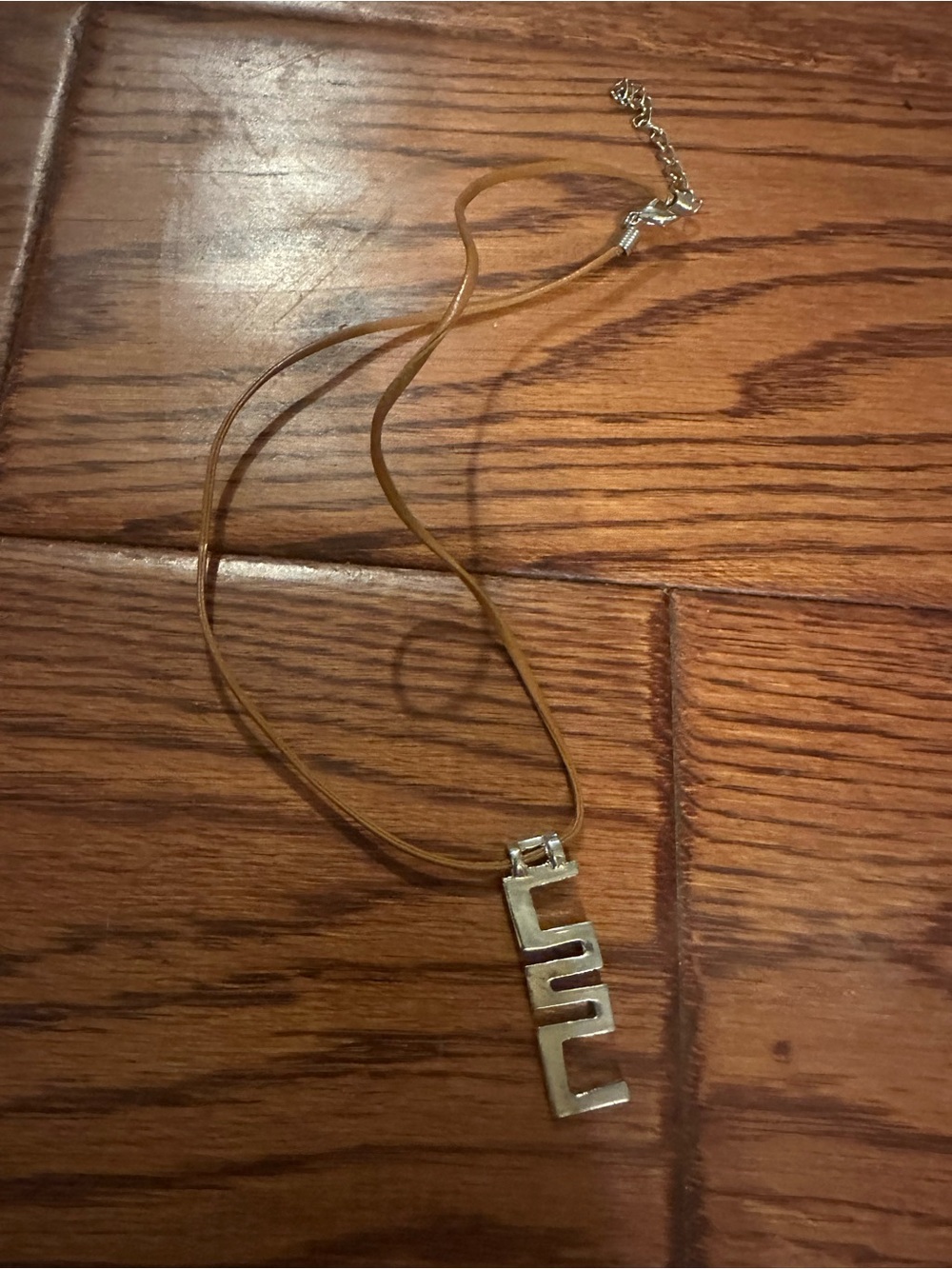 Geometric Silver Pendant Necklace on Brown Learher Cord